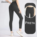 Calça legging feminina de cintura alta e modelagem slim para ioga, controle abdominal e academia.