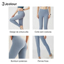 Calça legging feminina de cintura alta e modelagem slim para ioga, controle abdominal e academia.