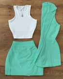 Conjunto feminino de 3 peças com colete de gola redonda, regata e minissaia, nova tendência de roupas femininas para o verão de 2025.