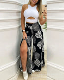 Conjunto feminino de duas peças, modelo 2025, com calça pantalona slim fit, macacão, saia e colete com estampa tropical.