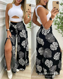 Conjunto feminino de duas peças, modelo 2025, com calça pantalona slim fit, macacão, saia e colete com estampa tropical.